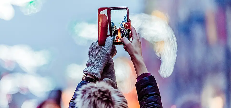 Person taking a picture with their phone